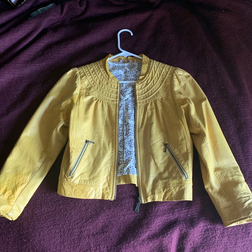 Yellow real leather jacket, has mark on the arm!